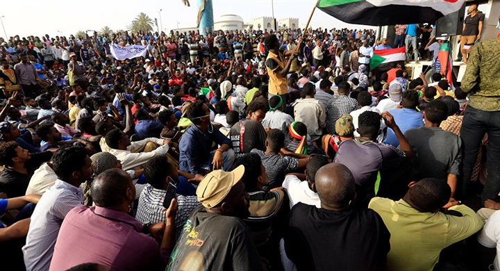 Sudanese people back