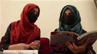 Afghan refugee gives
