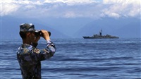 China reaffirms threat