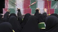 Iran holds funerals